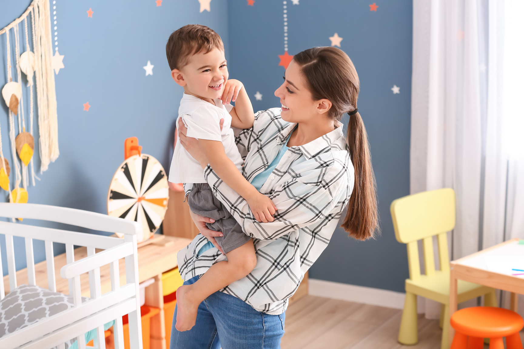 Nanny and Cute Little Boy at Home